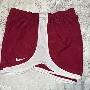 Maroon Nike running shorts